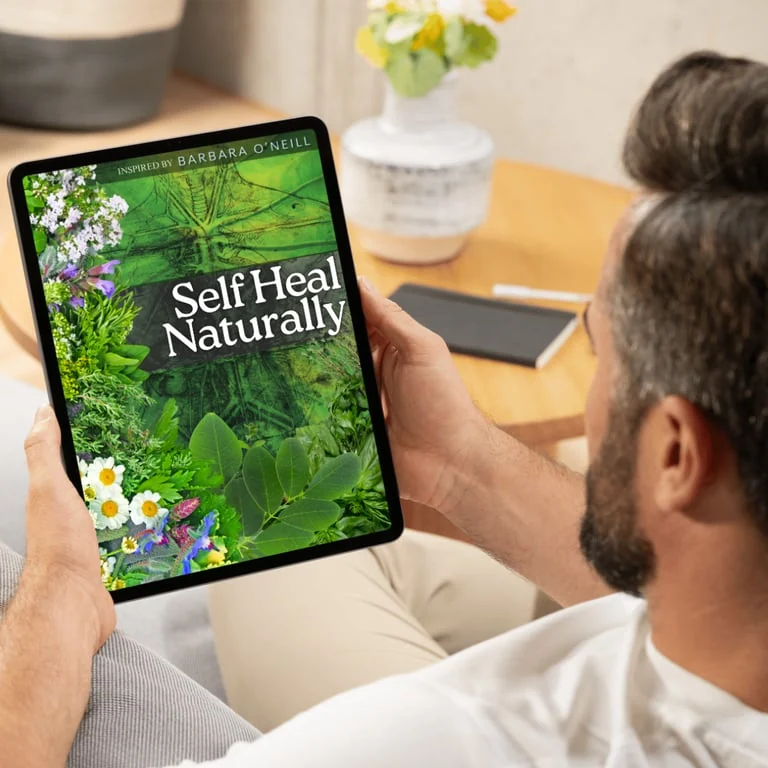 Self Heal Naturally digital bonus guide displayed on a tablet